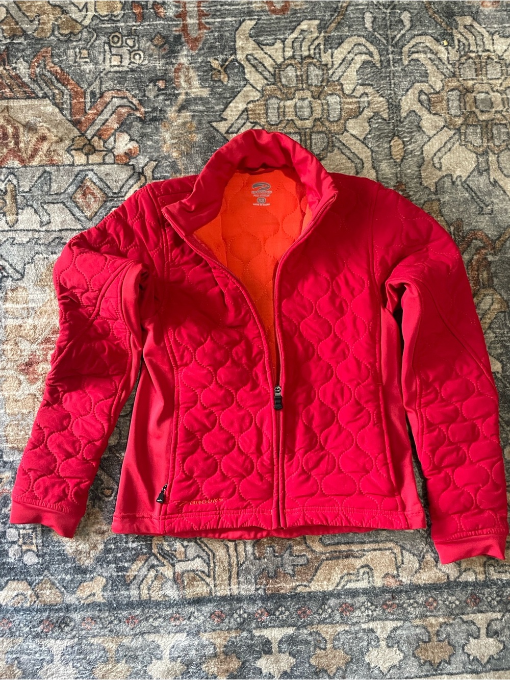 Brooks Women's Quilted Zip Top in Red  with Orange Lining - XS